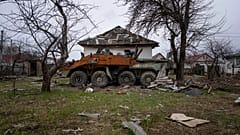 A Russian armoured fighting vehicle destroyed during the war with Ukraine is seen at the residential area in Yahidne