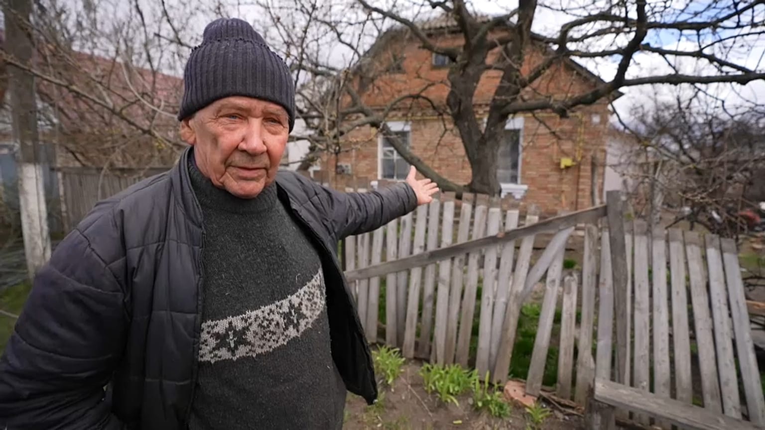 A man next to the spot where Russian forces allegedly killed his son. 
