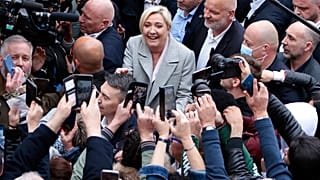 French far-right leader and presidential candidate Marine Le Pen campaigns, Monday, April 18, 2022 in Saint-Pierre-en-Auge, Normandy.