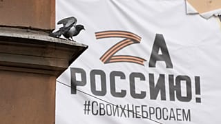 A banner with the letter Z hangs on a building in St. Petersburg.