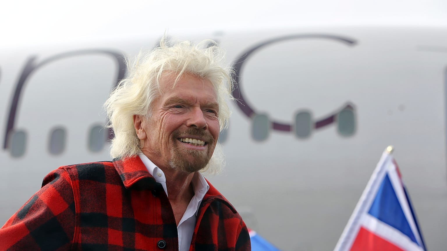 Virgin founder Sir Richard Branson arrives on a Boeing 787-9 for an event announcing Virgin Atlantic's new non-stop daily Seattle to London flights
