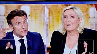  المتنافسان النهائيان في الانتخابات الرئاسية الفرنسية مارين لوبن و إيمانويل ماكرون خلال مناظرتهما المتلفزة 20 أبريل 2022
