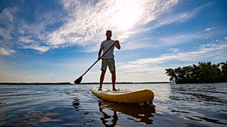 Paddleboarding to work.
