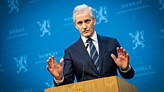 Norway's Prime Minister Jonas Gahr Store gestures during a press conference in Oslo.