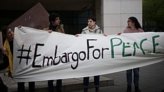 Fridays For Future climate activist from Ukraine, Nox Kubar (2nd right), at a protest outside Olaf Scholz's SPD party HQ, demanding an embargo on Russian energy, Apr. 22, 2022