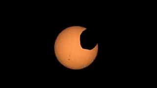 NASA’s Perseverance Mars rover captured footage of Phobos, one of Mars’s two moons, crossing the face of the sun on April 2, NASA said.