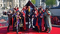Actor Benedict Cumberbatch poses for a photocall with cosplayers in London ahead of the release of 'Doctor Strange in the Multiverse of Madness'