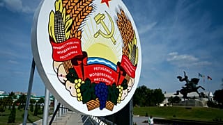 A huge coat of arms of Transnistria - Moldova's pro-Russian breakaway region on the eastern border with Ukraine, in Transnistria's capital of Tiraspol, September 11, 2021.