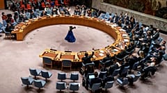 AP PFILE - Representatives voting in favor of a resolution raise their hands during a UN Security Council meeting on the Russian invasion of the Ukraine, 25 February, 2022
