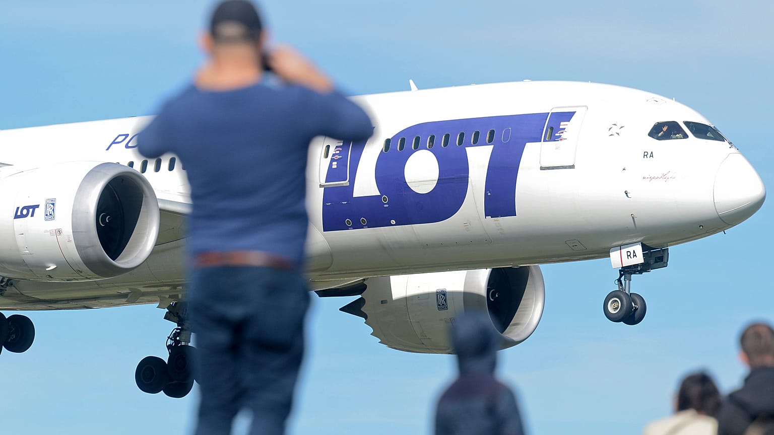 A Polish Airlines LOT jetliner lands at the Frederic Chopin airport in Warsaw.