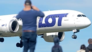 A Polish Airlines LOT jetliner lands at the Frederic Chopin airport in Warsaw.