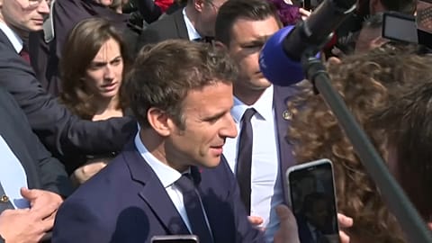 Macron targeted by tomato throw during first trip since re-election