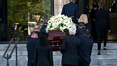 The casket of former Secretary of State Madeleine Albright is carried into the Washington National Cathedral for a funeral service in Washington