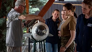 Demining instructor Artur Tigani, left, briefs a group of Ukrainian female emergency services personnel for specialist training in explosive ordnance disposal.