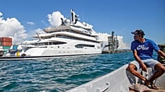Boat captain Emosi Dawai looks at the superyacht Amadea where it is docked at the Queens Wharf in Lautoka, Fiji, on 13 April, 2022.