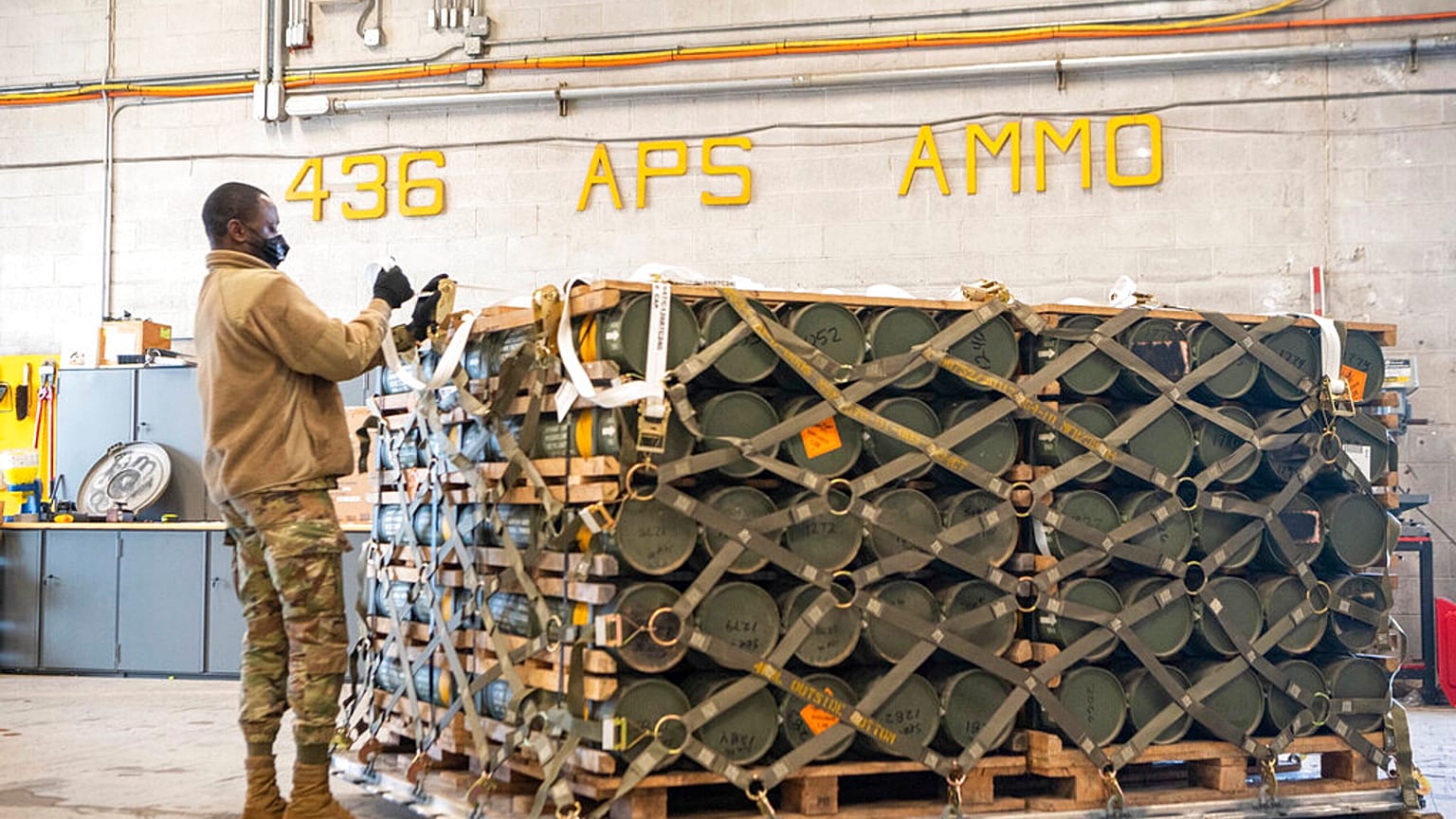 ammunition, weapons and other equipment bound for Ukraine during a foreign military sales mission at Dover Air Force Base, Del., Jan. 21, 2022.