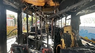 After noticing the smoke, the bus driver pulled the vehicle to the side of the road and evacuated the passengers. 