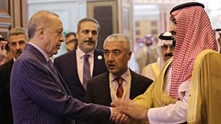 Turkish President Recep Tayyip Erdogan, left, and Saudi Arabia's Crown Prince Mohammed bin Salman speak after their meeting in Jiddah, Saudi Arabia, Friday, April 29, 2022.