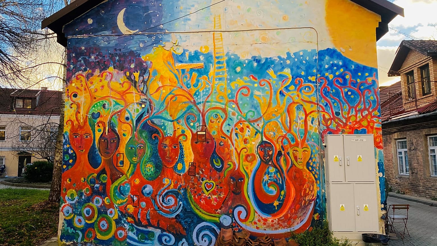 One of the many decorated buildings in Užupis.