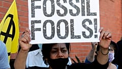 Climate activists protest demanding a renewable energy future for Africa during the Africa Energy Week 2021