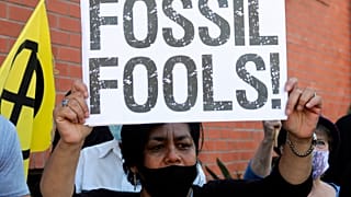 Climate activists protest demanding a renewable energy future for Africa during the Africa Energy Week 2021