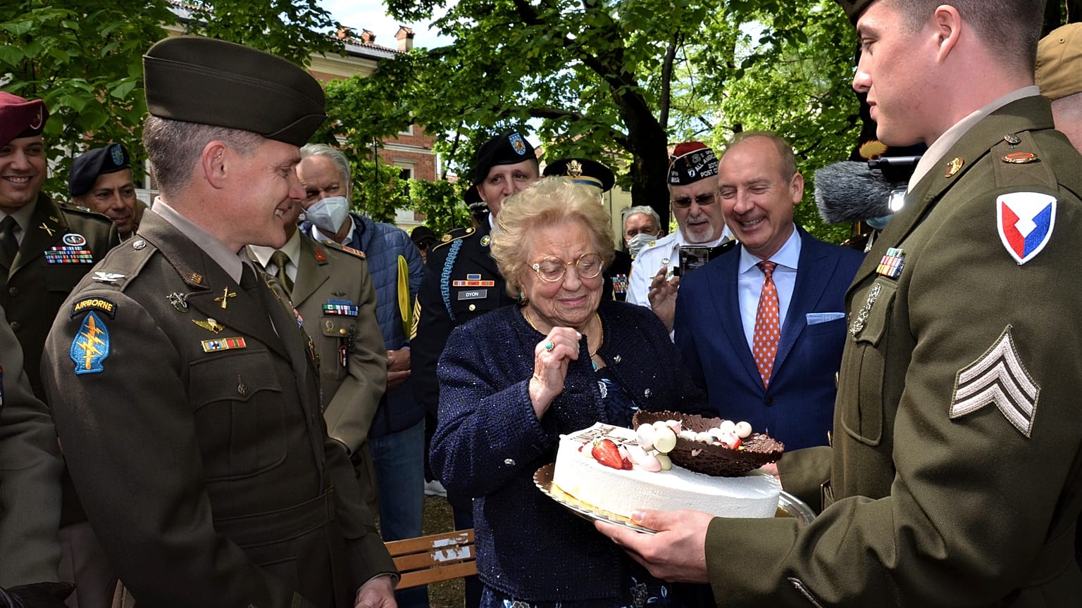 The cake was presented to 90-year-old Meri Mion by soldiers from US Army Garrison Italy.