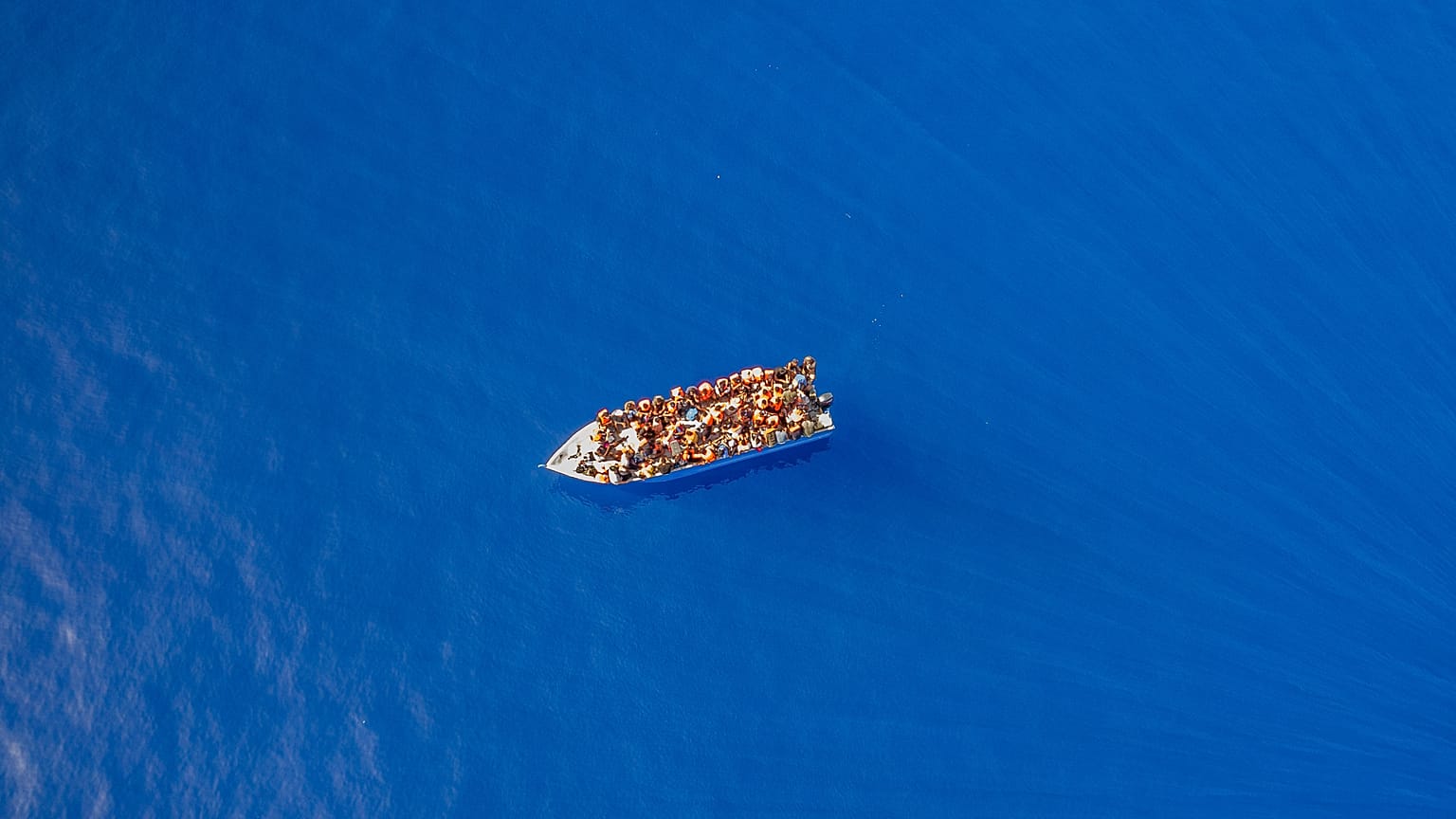 According to UNHCR, the increase in migration is due to political instability, conflict, and climate change.