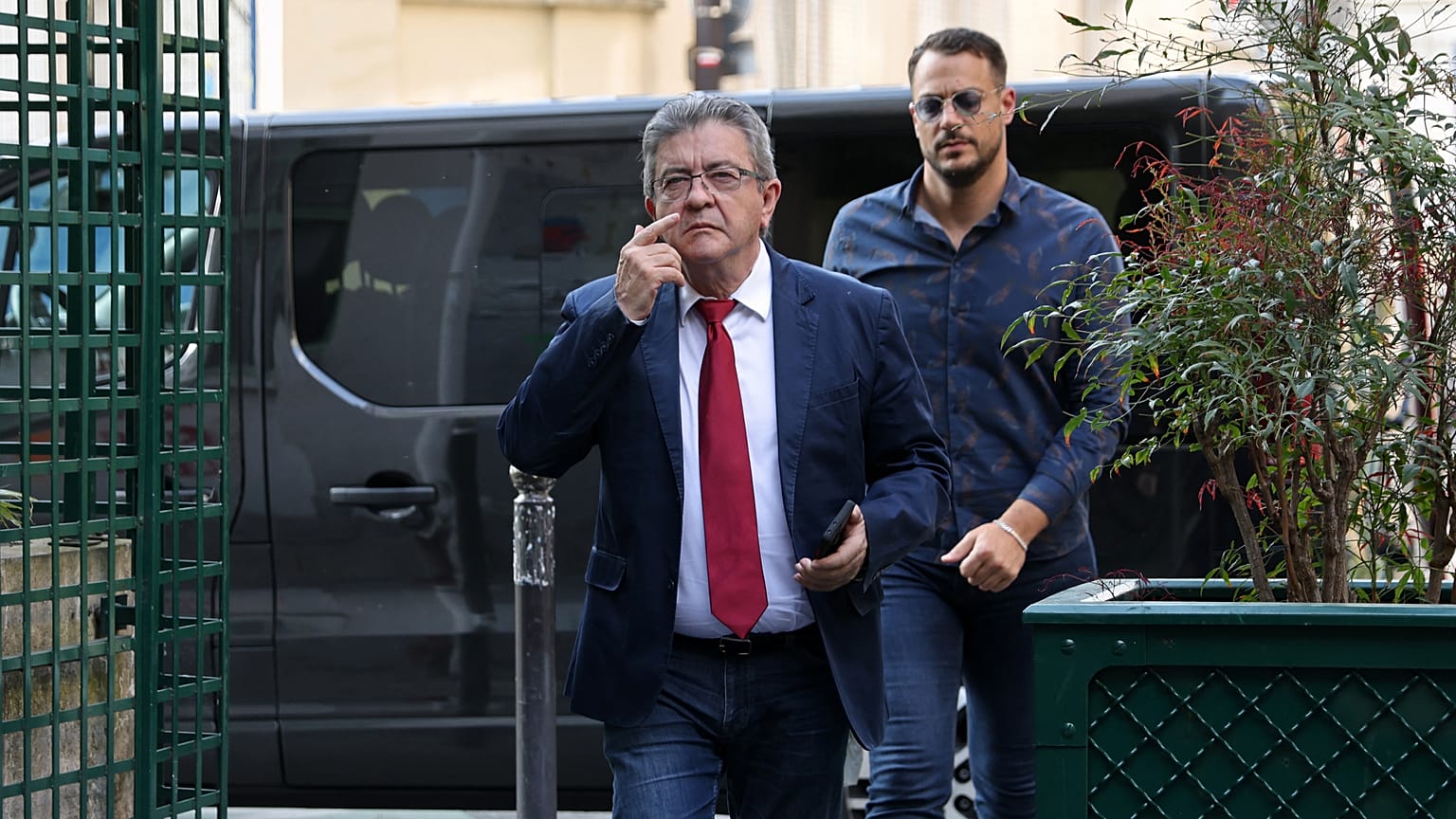 France's leftist movement La France Insoumise (LFI) party leader Jean-Luc Melenchon arrives to his party's headquarters
