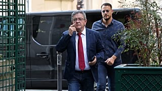 France's leftist movement La France Insoumise (LFI) party leader Jean-Luc Melenchon arrives to his party's headquarters