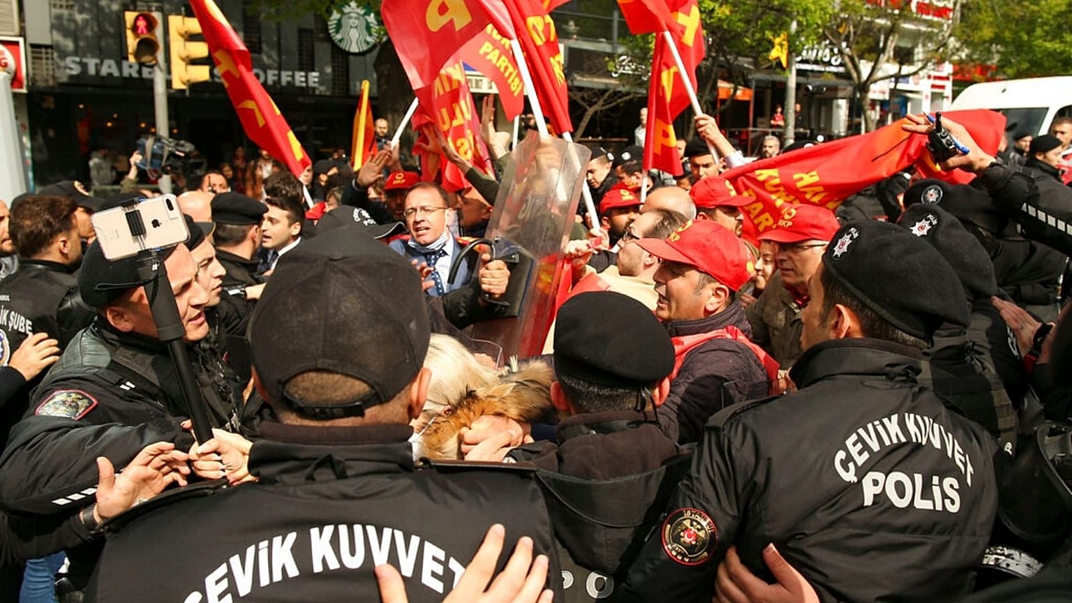 Demonstrators clash with Turkish police during a May Day protest in Istanbul
