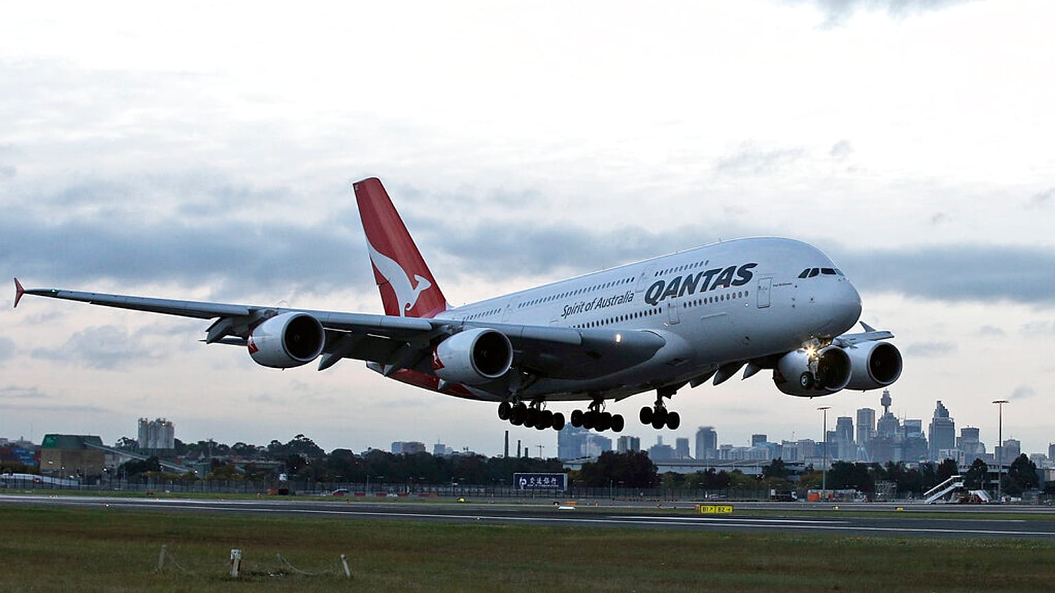A Qantas plane landing.