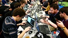 Cyber Security experts take part in a test at the Cybersecurity Conference in Lille, northern France, Tuesday Jan. 22, 2019. 