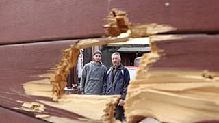 Ivan Gontar (derecha) con su hijo