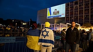 People gather in Tel Aviv to watch an address by Ukrainian President Volodymyr Zelenskyy in March.