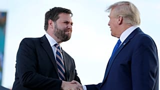 Senate candidate JD Vance, left, greets former President Donald Trump at a rally at the Delaware County Fairground, April 23, 2022, in Delaware, Ohio.