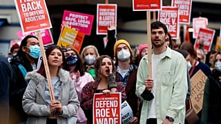 rally at Westlake Park in Seattle, Tuesday, May 3, 2022, in response to news that the US Supreme Court could be poised to overturn a landmark 1973 abortion rights case.