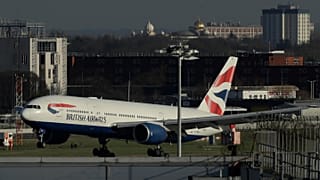 A plane lands at Heathrow Airport in London.