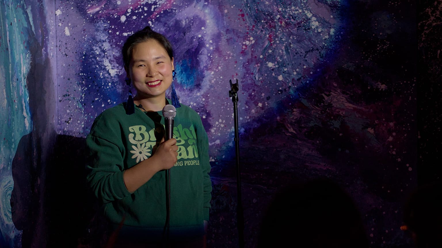 Moni Zhang performing onstage 