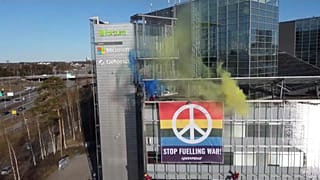 Greenpeace activists hang anti-war banner on power firm Fortum`s HQ
