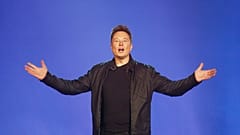 FILE - Tesla CEO Elon Musk introduces the Cybertruck at Tesla's design studio, 2019 