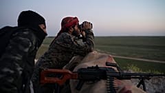 عنصران تابعان لتنظيم الدولة الإسلامية في العراق