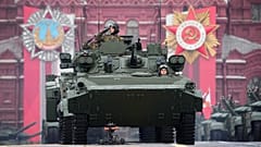 Russian military vehicles roll during the Victory Day military parade in Moscow, Russia, Monday, May 9, 2022, marking the 77th anniversary of the end of World War II