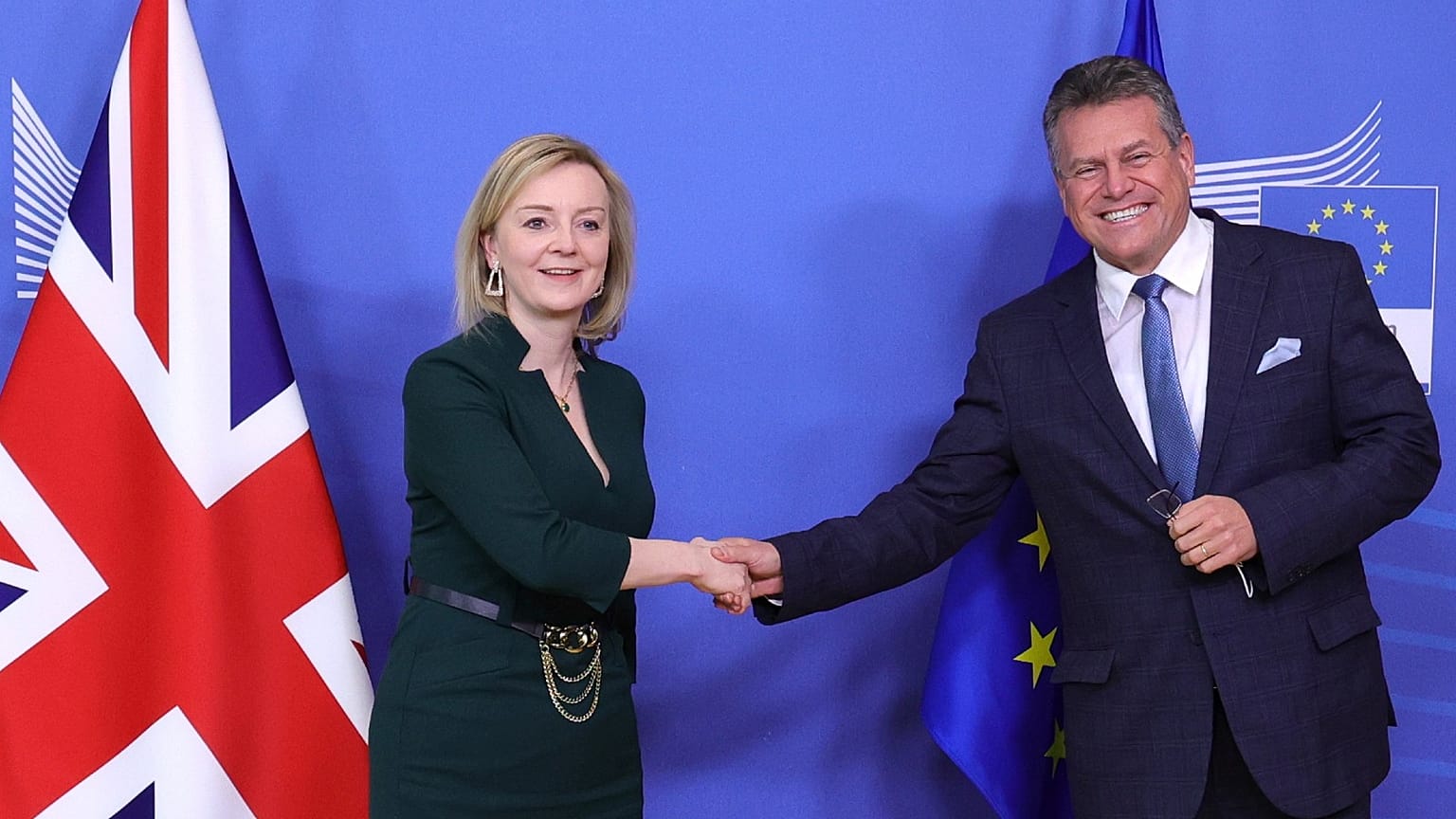 uropean Commissioner for Inter-institutional Relations and Foresight Maros Sefcovic, right, greets British Foreign Secretary Liz Truss,  in Brussels, Monday, Feb. 21, 2022.