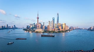 Shanghai is located on the coast of the East China Sea between the mouth of the Yangtze River (Chang Jiang) to the north and the bay of Hangzhou to the south.