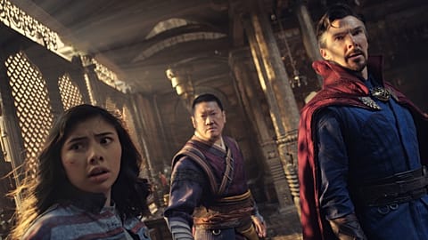 This image released by Marvel Studios shows, from left, Xochitl Gomez as America Chavez, Benedict Wong as Wong, and Benedict Cumberbatch as Dr. Stephen Strange.