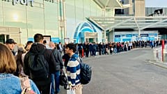Queues this morning at Birmingham Airport, snaking out of the terminal
