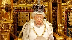 Britain's Queen Elizabeth II reads the Queen's Speech from the throne during the State Opening of Parliament in the House of Lords in London, Wednesday, May, 18, 2016. 