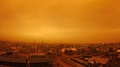 Smoke from forest fires is see over small town of Kysyl-Syr, Vilyuysky District, Sakha Republic also known as Yakutia, Russia Far East, 2021.
