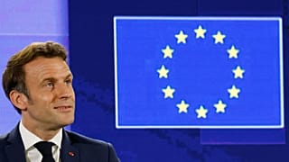 France's President Emmanuel Macron gestures he delivers a speech during the Conference on the Future of Europe and the release of its report with proposals for reform