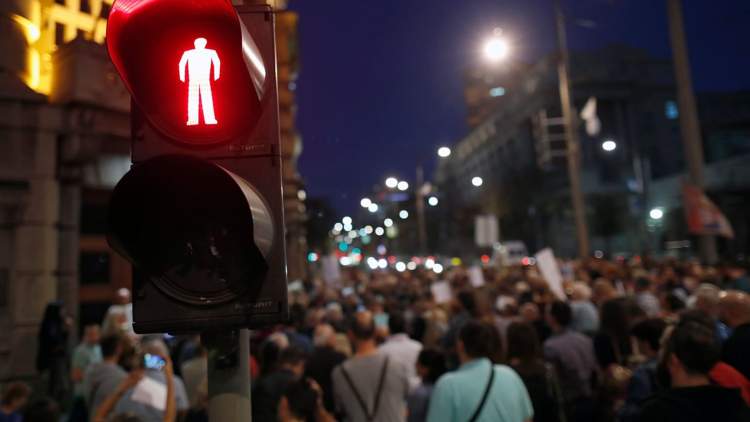 Journalists gathered during a protest organised by the Group for Media Freedom in front of the government headquarters in Belgrade, Serbia, Wednesday, Oct. 16, 2019.